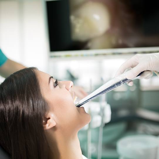 Dentist capturing intraoral images