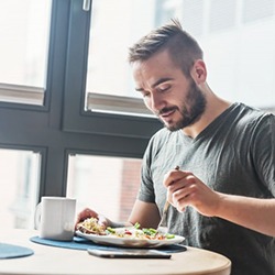 a man enjoying a healthy meal