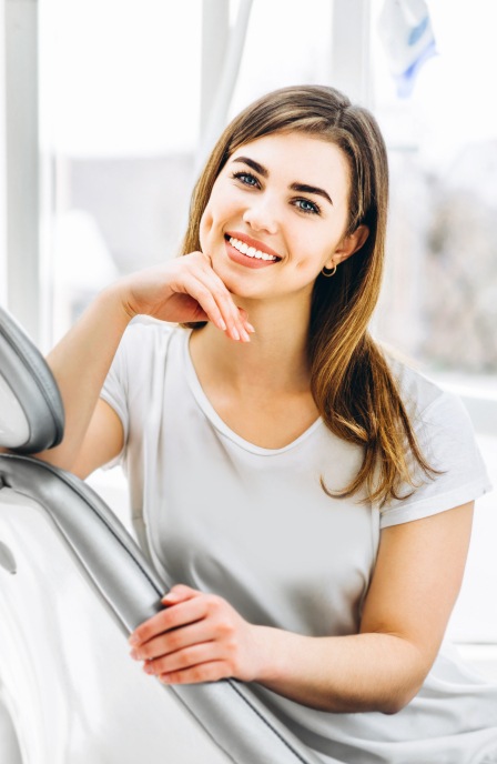 Smiling woman in dental chair