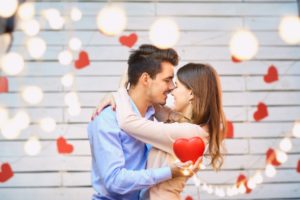 Smiling couple embracing on Valentine’s Day